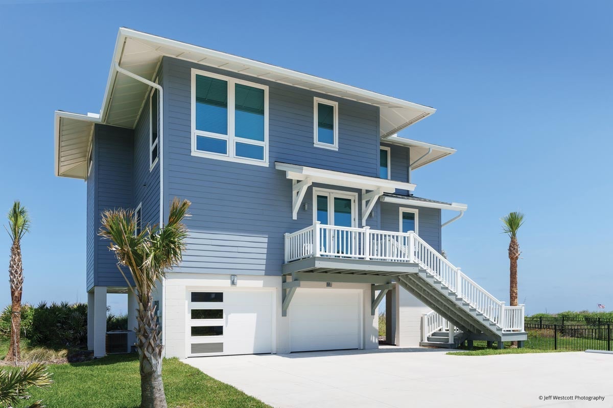 AM901 - exterior view of beach home with multiple Forgent windows