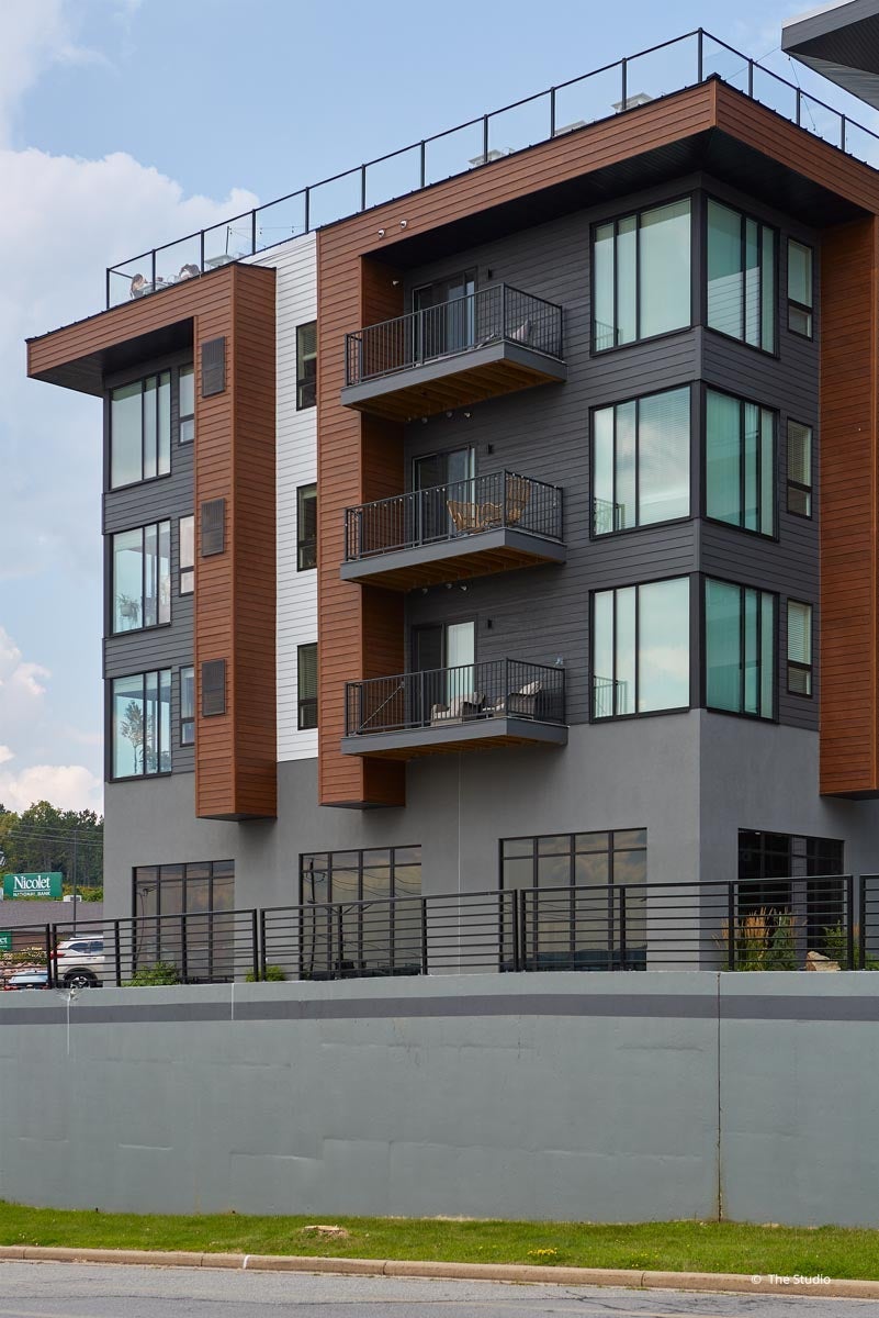 AO923 - Exterior of commercial building with VistaLuxe AL and Forgent windows and doors