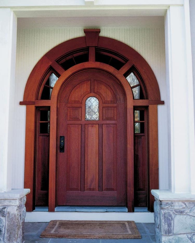 Heritage Series radius inswing entrance door with sidelites and a radius transom