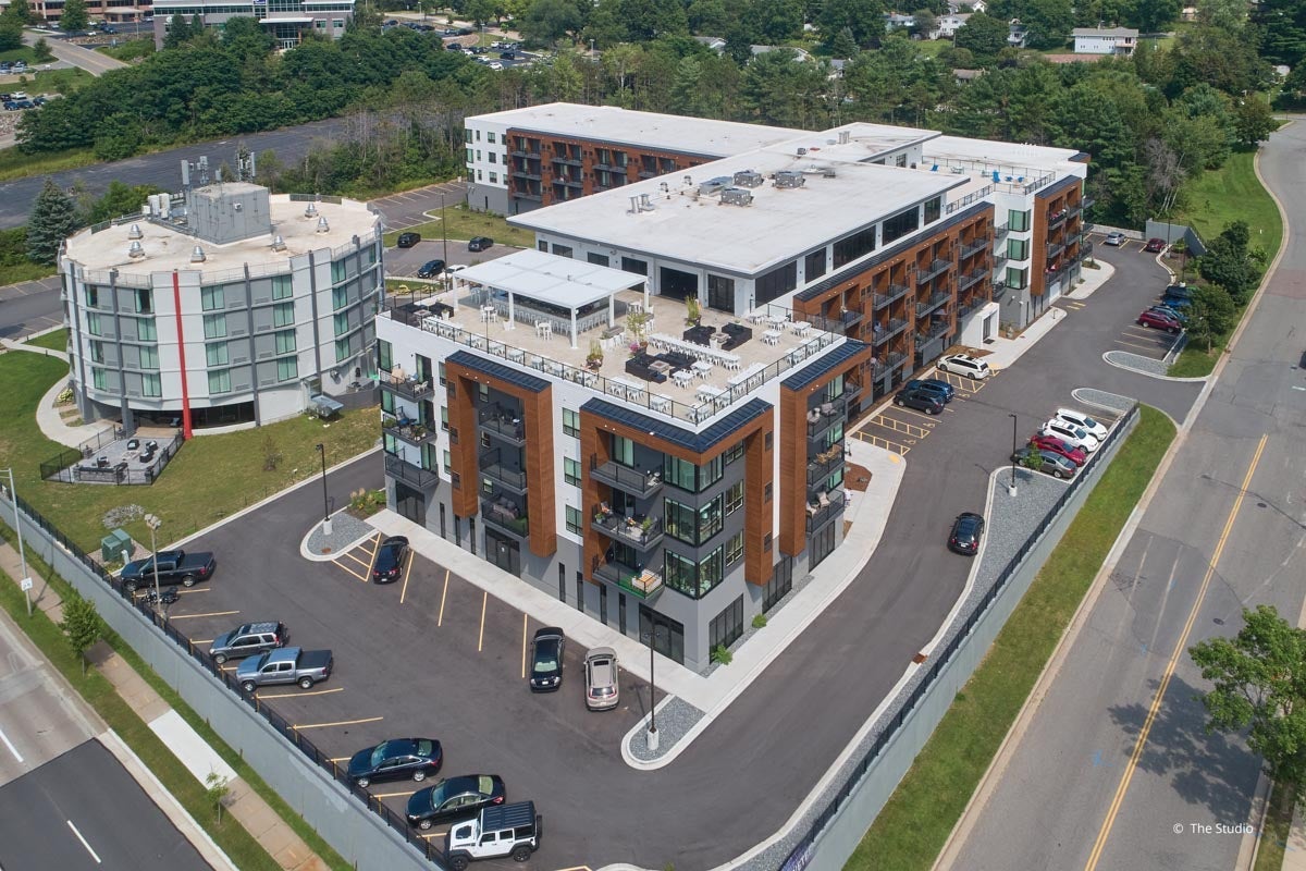 AO903 - Exterior of commercial building with VistaLuxe AL and Forgent windows and doors