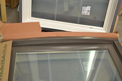 CS35-3, Head & Sill Trim Curves Out to Exterior (exterior closeup)