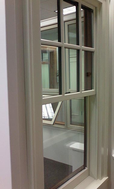 CS07-1, Sterling Single Hung  with All-Wood Jamb Liner Covers (exterior side view)