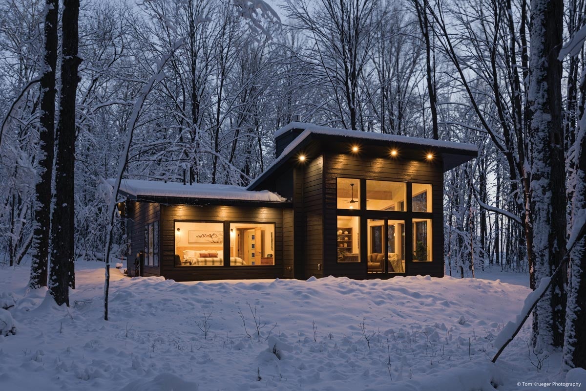 AM302 - exterior of home with floor to ceiling direct set windows and sliding patio door