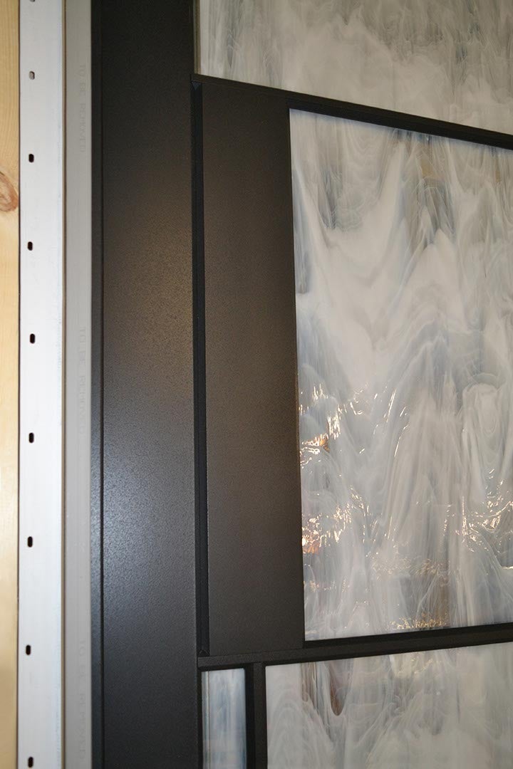 CS91-06, Door with Whispy Glass & Spring Hinges(exterior closeup of glass & push pad)