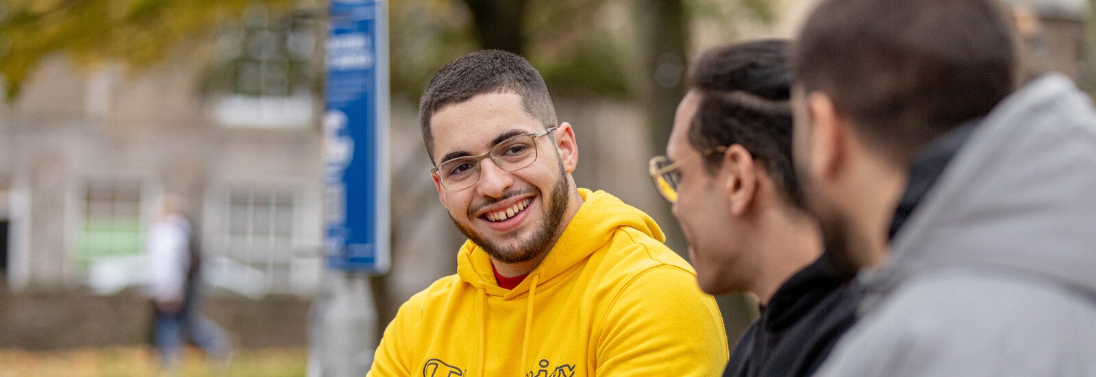 Aberdeen University students sat outside on campus