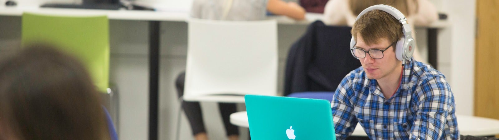 Student studying on laptop 