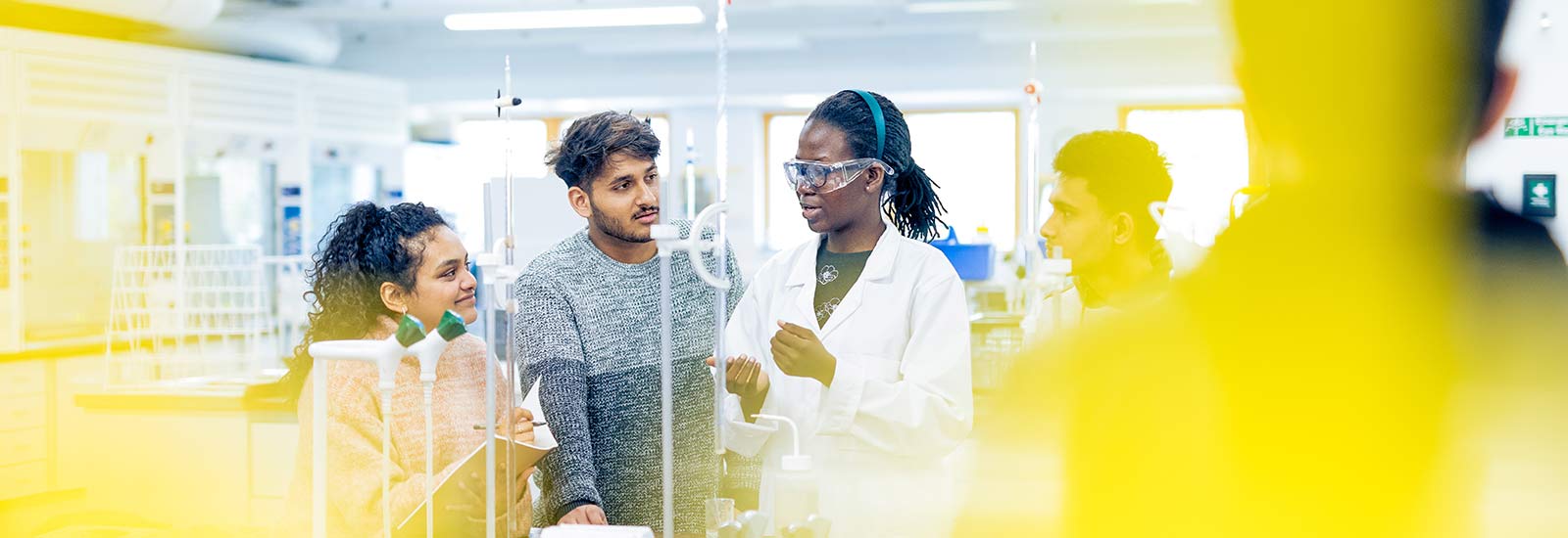 Kingston University students working in a lab