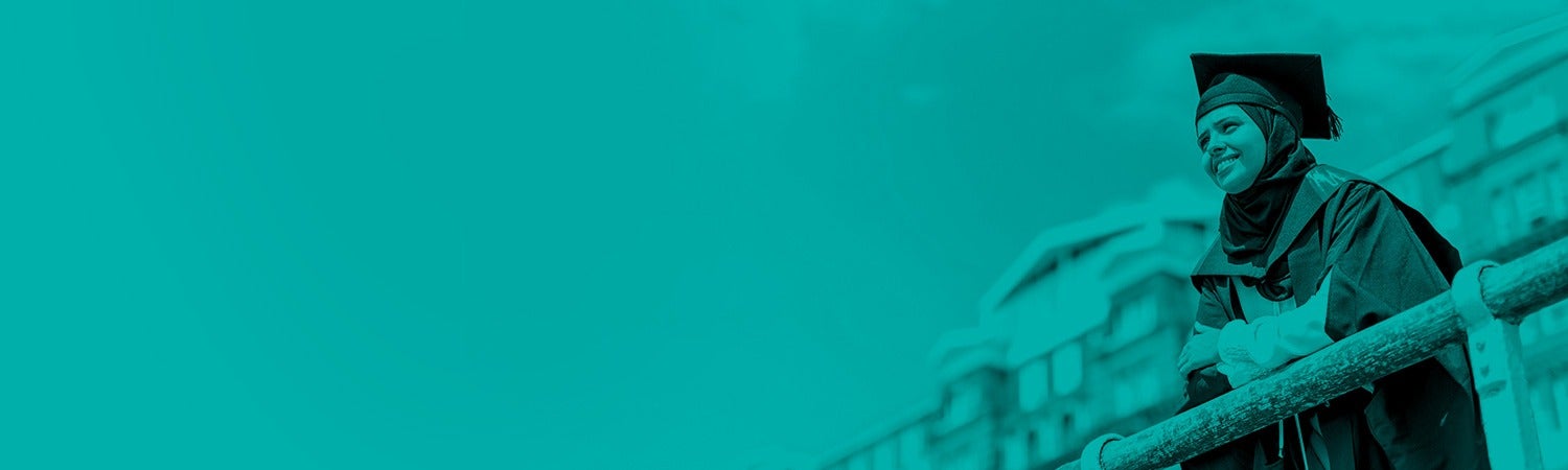 Student standing on Brighton seafront