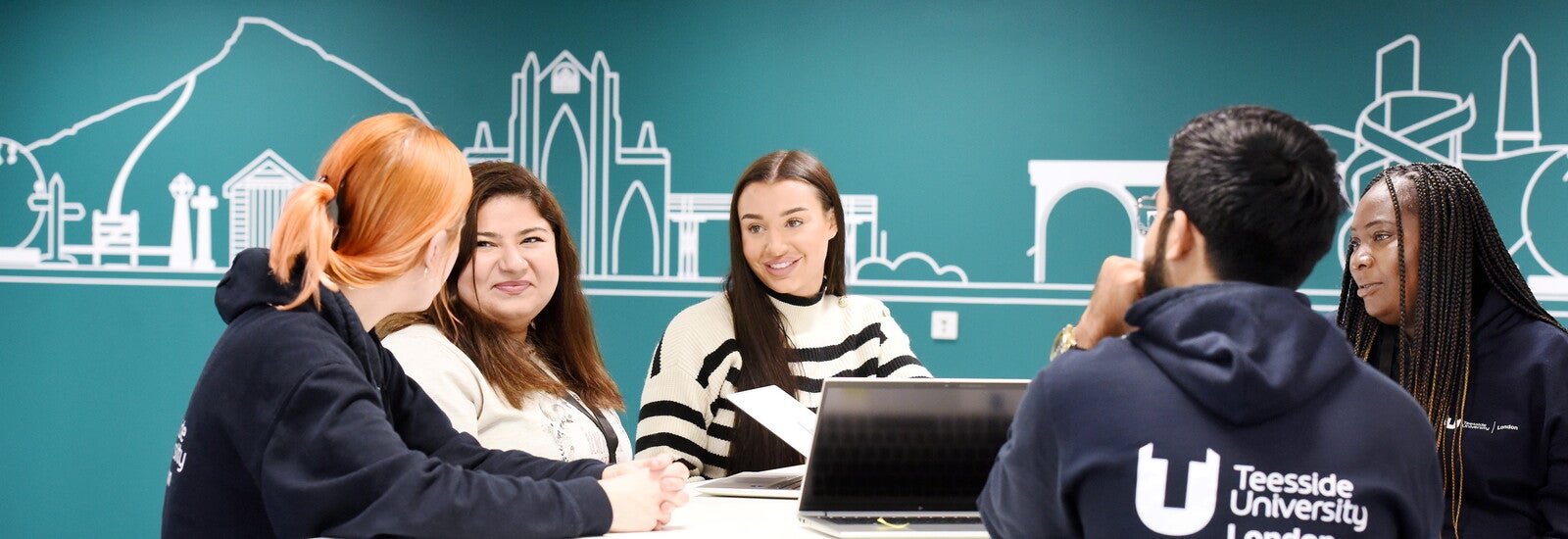 Students studying together on campus