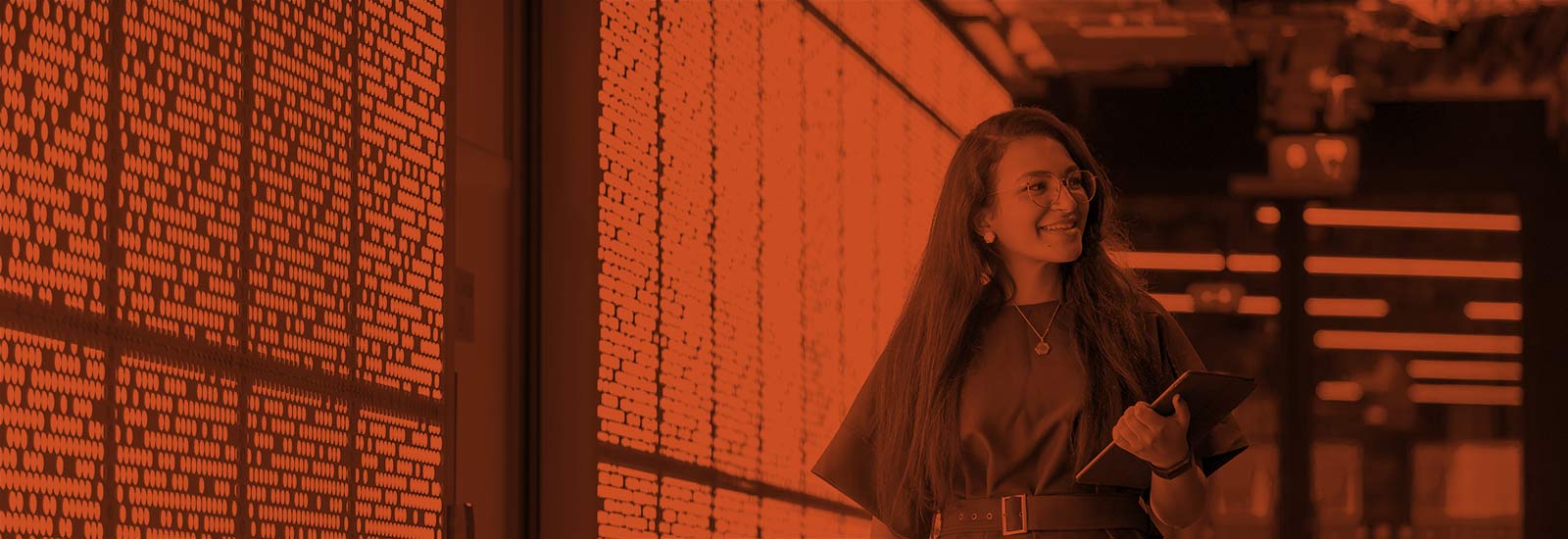 A University of Sussex student walking through campus