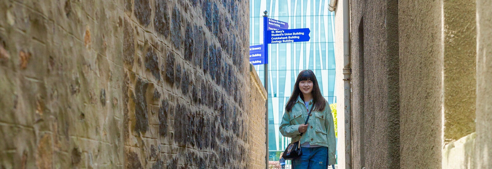 Student walking through Aberdeen