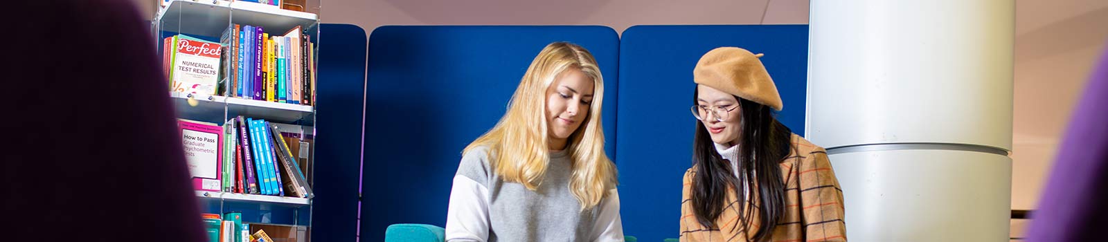 Students standing and chatting