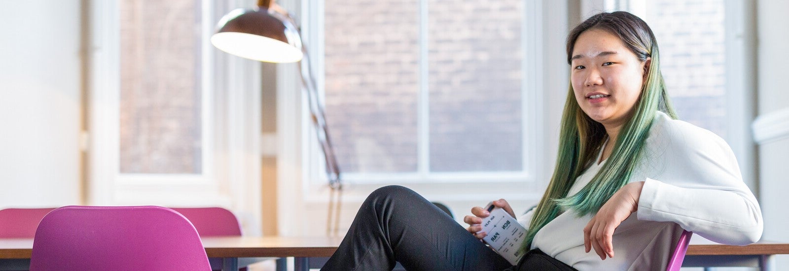 Student smiling in accommodation