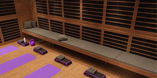 Ce studio de yoga chaud voulait offrir à ses clients une chaleur infrarouge avec des plafonds de 10′ permettant une gamme complète de mouvements dans un espace commercial conforme aux normes ADA. Nous avons conçu des bancs amovibles pour maximiser l'espace intérieur pour le yoga dirigé par un instructeur, avec un plancher qui permet également les cours de spinning.