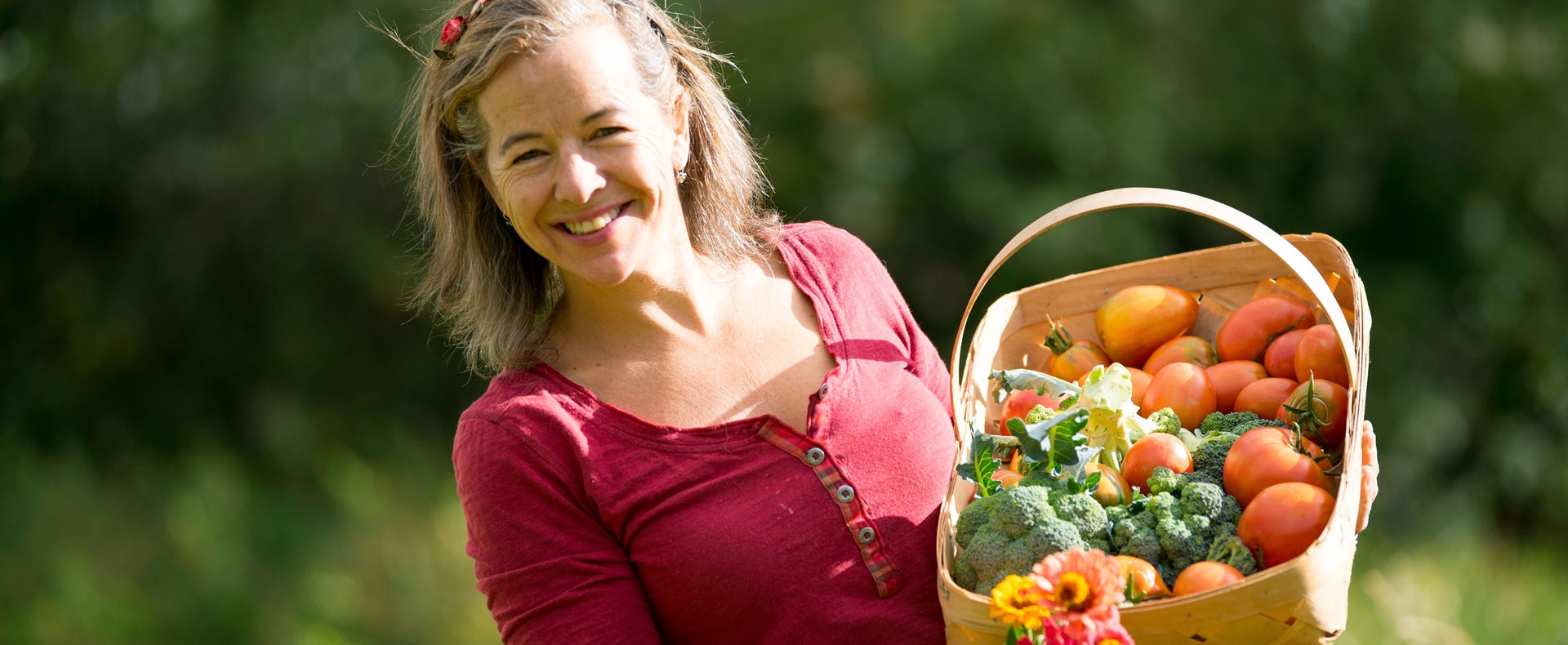 Alison with basket of vegetables