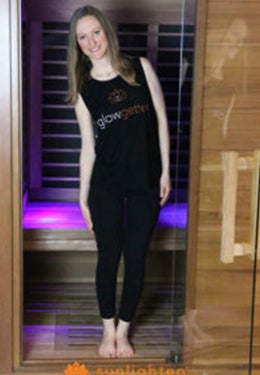 Standing side stretch in sauna