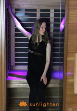 Seated shoulder stretch in sauna