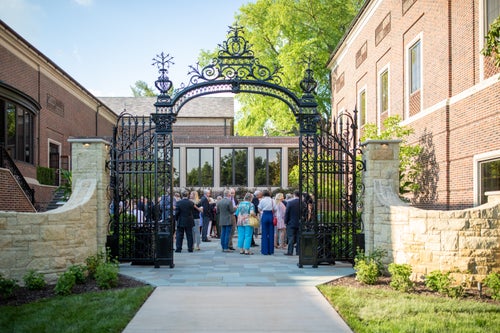 Reception guests in the Linda Hall Library Bartlett Courtyard