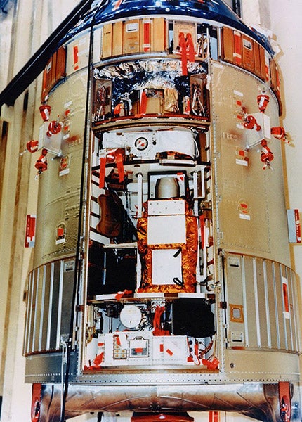 Panel removed to show the SIM bay on the command module Endeavour, which housed all the instruments used by Worden while in lunar orbit. He later made an EVA to retrieve film capsules from the bay to bring back home (Wikimedia commons)