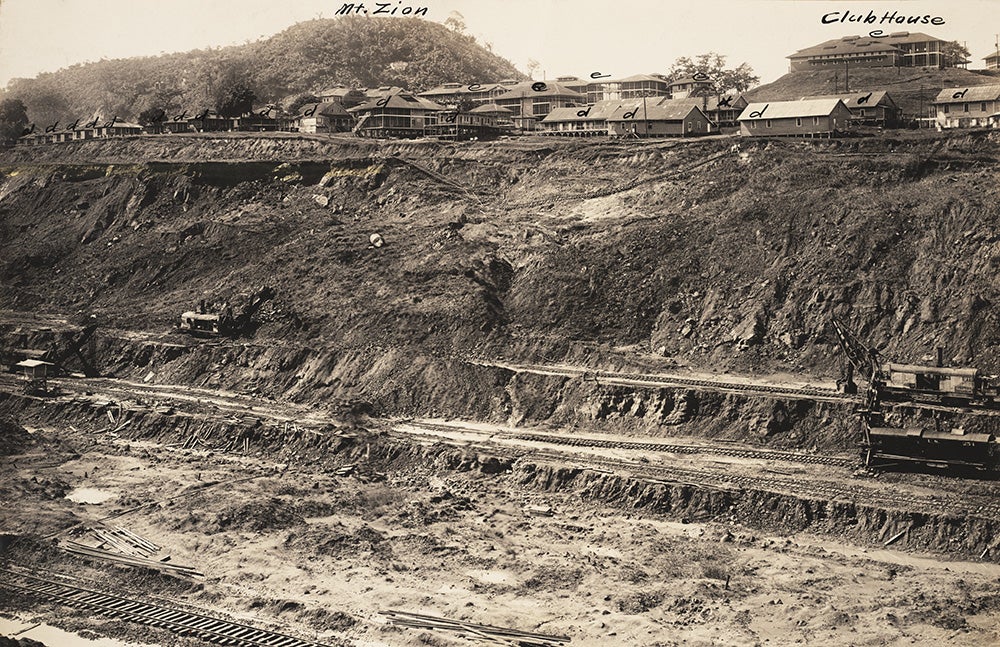 Buildings at the town of Culebra threatened by slide.
 In January 1910, the buildings marked “d” along Steam Shovel Row in Culebra were close to sliding into the Cut. In November, they were dismantled and moved. One year later in January 1911, the slide had crept as far as the buildings marked “e,” which were also dismantled and moved. Eventually 75 acres of the town slid into the Cut. View in Digital Collection »