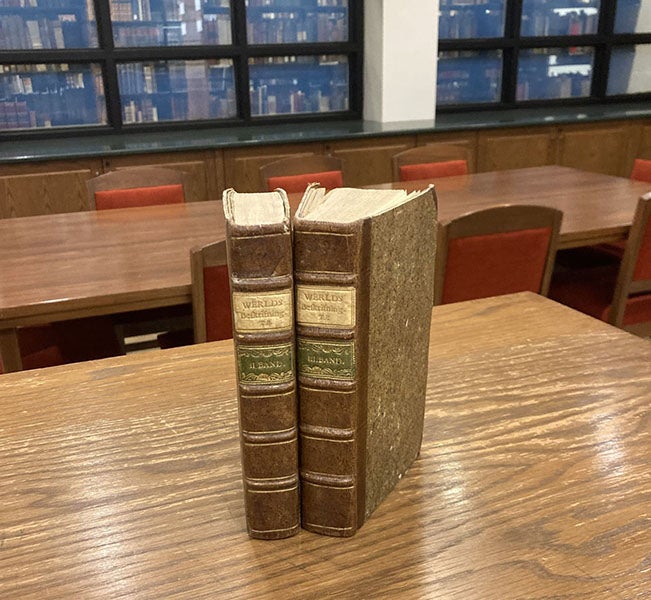 The two volumes of Physisk Beskrifning öfver Jord-Klotet (1773-74), by Torbern Bergman, in the rare book reading room (Linda Hall Library)