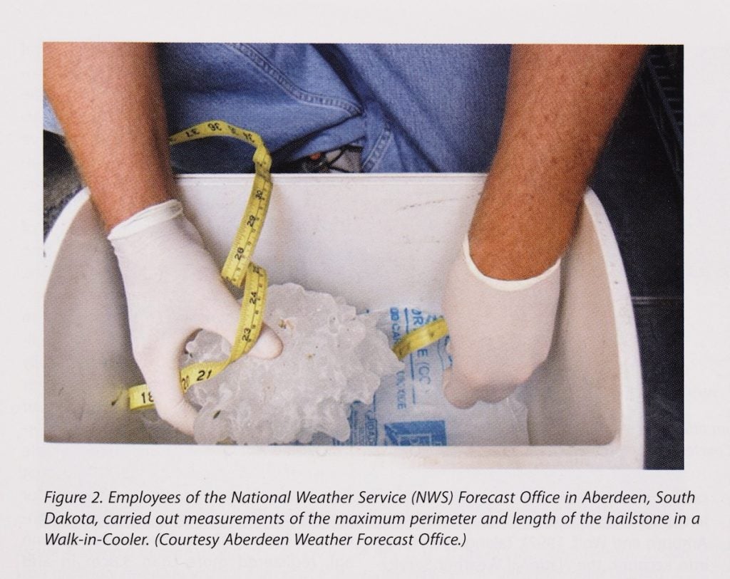Image source: National Weather Service photograph in Monfredo, William. “Investigation into the Record Hailstone on 23 July 2010 at Vivian, South Dakota, USA.” Weather, vol. 66, no. 8, 2011, p. 217. View Source