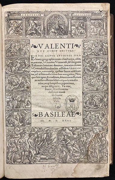 Title page of Strabonis geographicorum, with the name of the printer, Valentinus Curio of Basel, overshadowing that of Strabo, 1523; woodcut border by Hans Holbein (The Linda Hall)