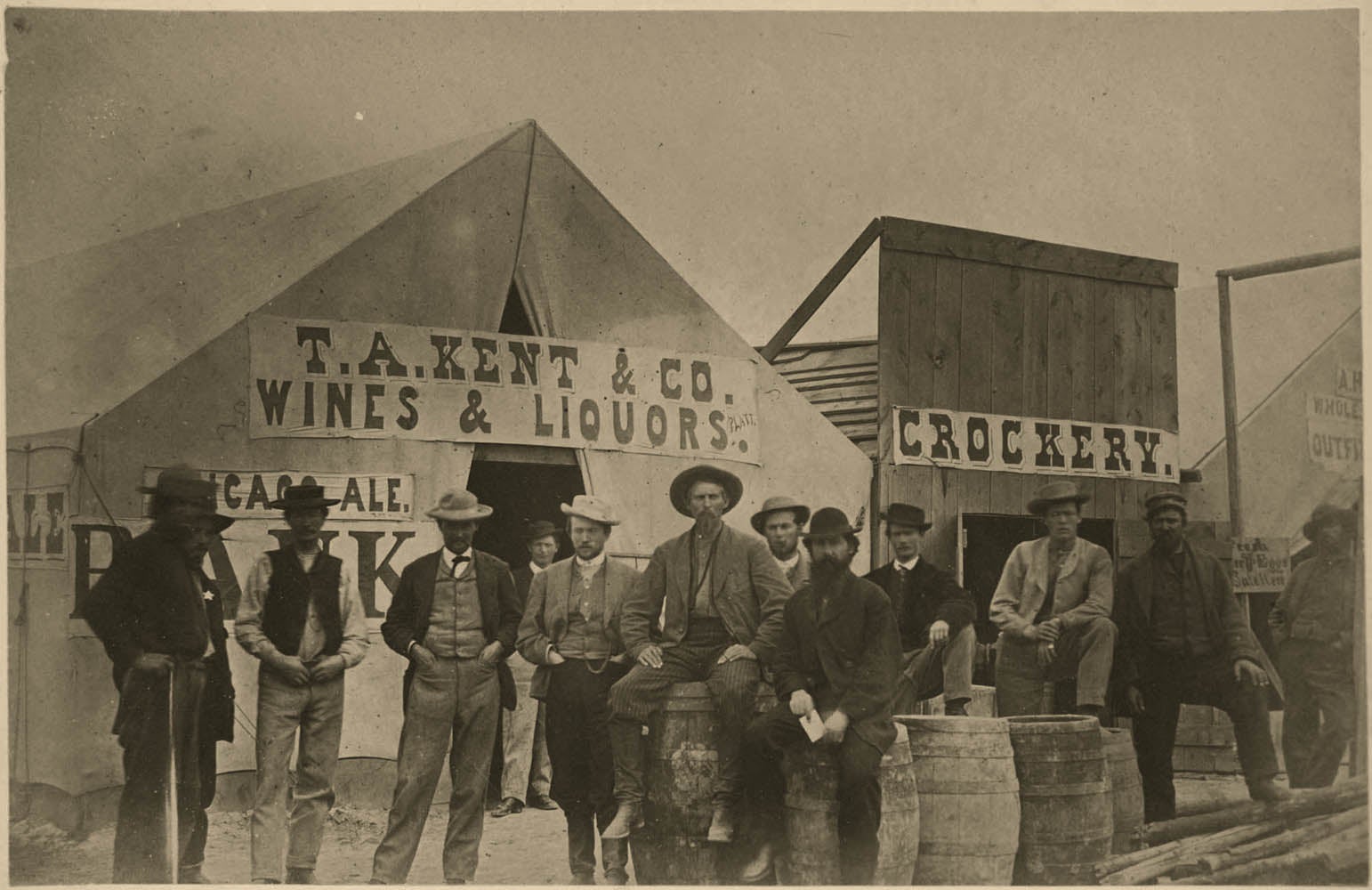 Photograph of Benton, Wyoming, along the Union Pacific line 672 miles west of Omaha. Located 11 miles east of the present-day town of Rawlins, Benton only existed for three months from July to September, 1868. The tent city boasted a population of 3,000 people, and included 25 saloons, and five dance halls. 