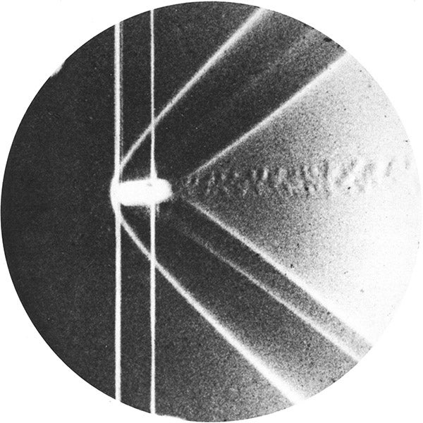 Shock wave produced by a supersonic bullet, photograph by Ernst Mach, ca 1888 (Wikimedia commons)