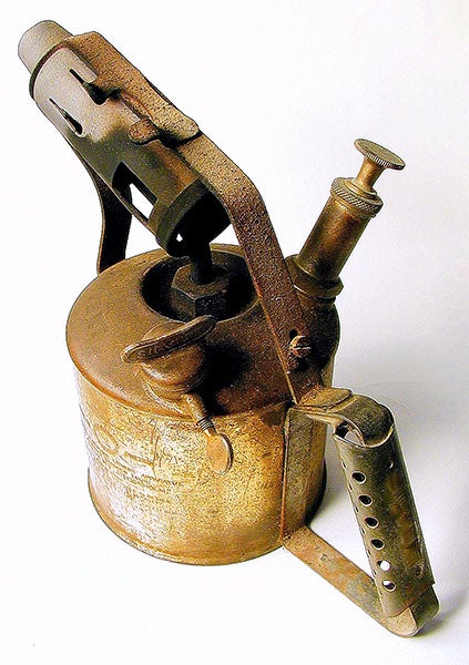 An early handheld blowtorch, ca 1880s (Wikimedia commons)