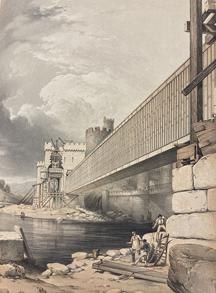 View of the first tube of the Conwy Tubular Bridge in place, while a hydraulic jack stands ready to hoist the second tube (out of the field of view) into position, detail of tinted lithograph in The Britannia and Conway Tubular Bridges, by Edwin Clark, published with the sanction and under the supervision of Robert Stephenson, Atlas, plate 36, 1850 (Linda Hall Library)