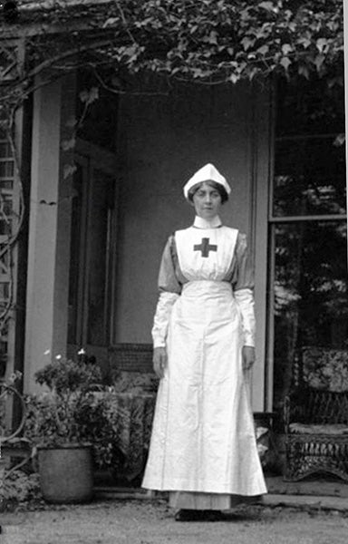 Agatha Christie in the garb of the British Red Cross, photograph, 1915; one year later, she would finish writing her first mystery novel featuring Hercule Poirot (Wikimedia commons)