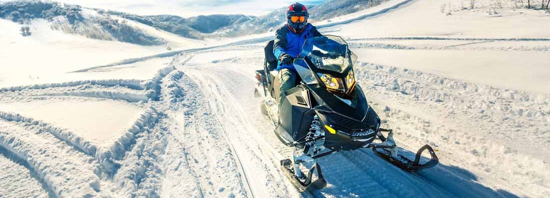 Driving snowmobile in Colorado. Find Snowmobile Insurance.
