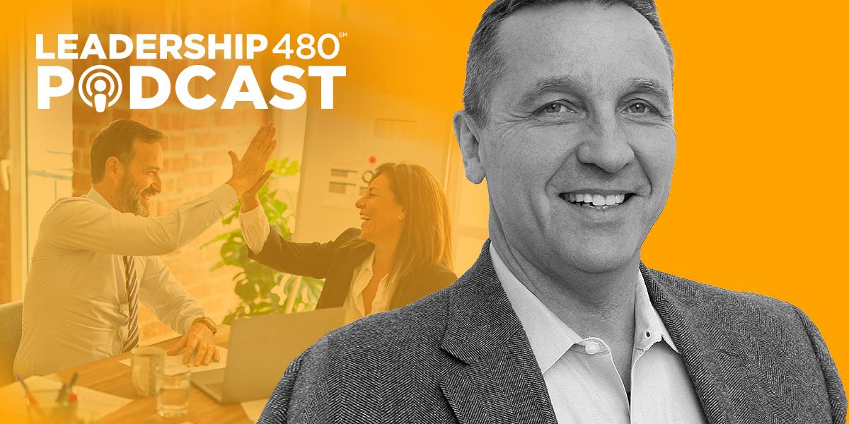 two business professionals high-fiving in the background with a large headshot of Andrew Gill, the guest on this episode of DDI's Leadership 480 podcast on learning to lead from the middle