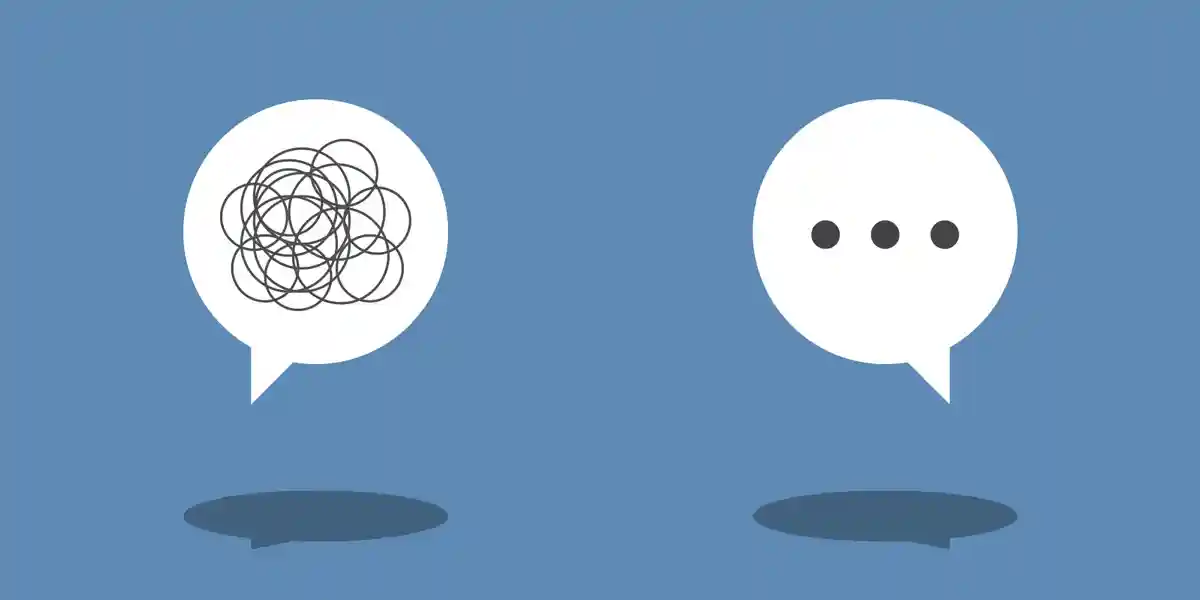 illustration of two giant conversation bubbles: the one to the right has three dots to show a positive way to give feedback and the one to the left has a bunch of squiggles to show feedback gone wrong, as this blog is about why feedback fails in the workplace