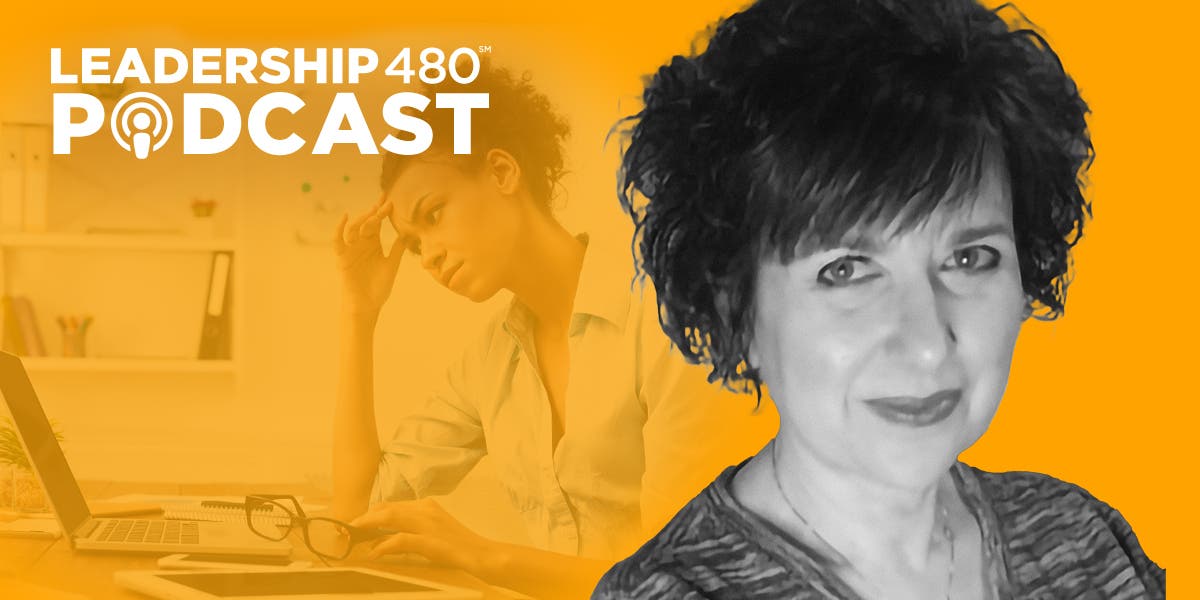 photo of Dr. Geri Puleo with a woman leader in the background looking stressed out as she works on her laptop in the background to show that this leadership 480 podcast episode is about women and burnout in leadership