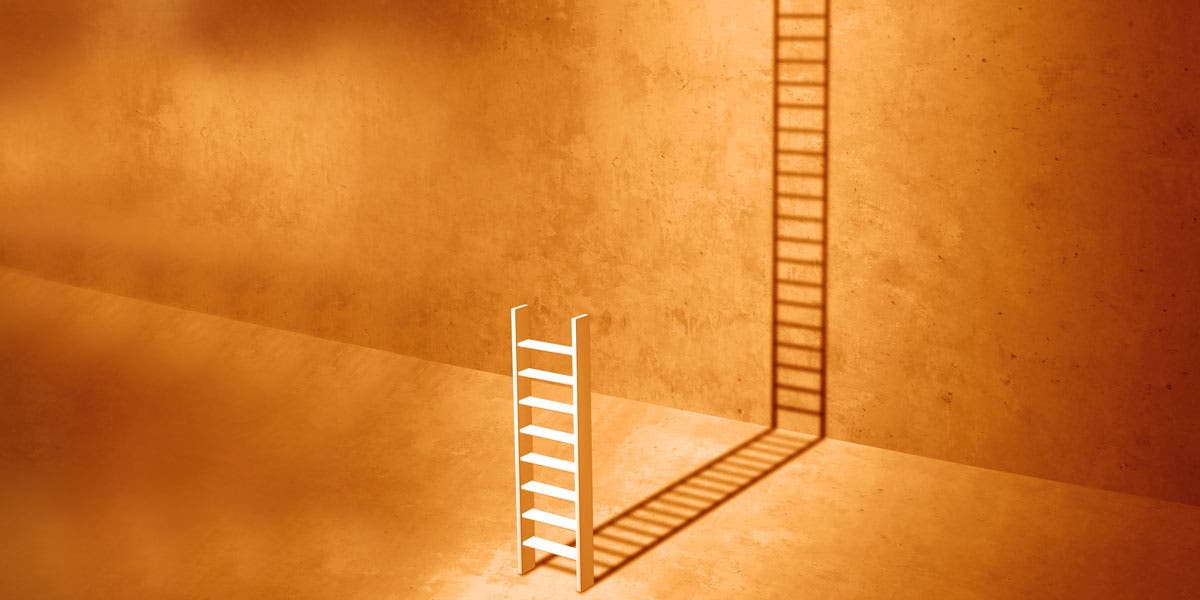 a ladder projecting the shadow of a bigger ladder