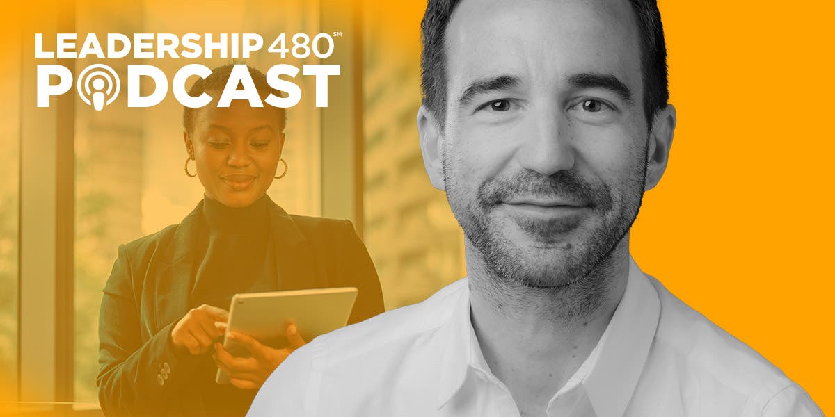 a confident woman leader looking down at her notebook in the background with a large headshot of organizational psychologist Dr. Tomas Chamorro-Premuzic, the guest on this episode of DDI's Leadership 480 podcast on humility and confidence in leadership