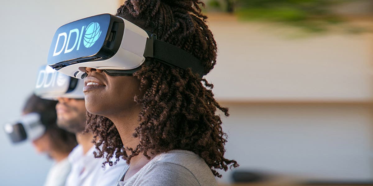 a woman wearing a virtual reality headset