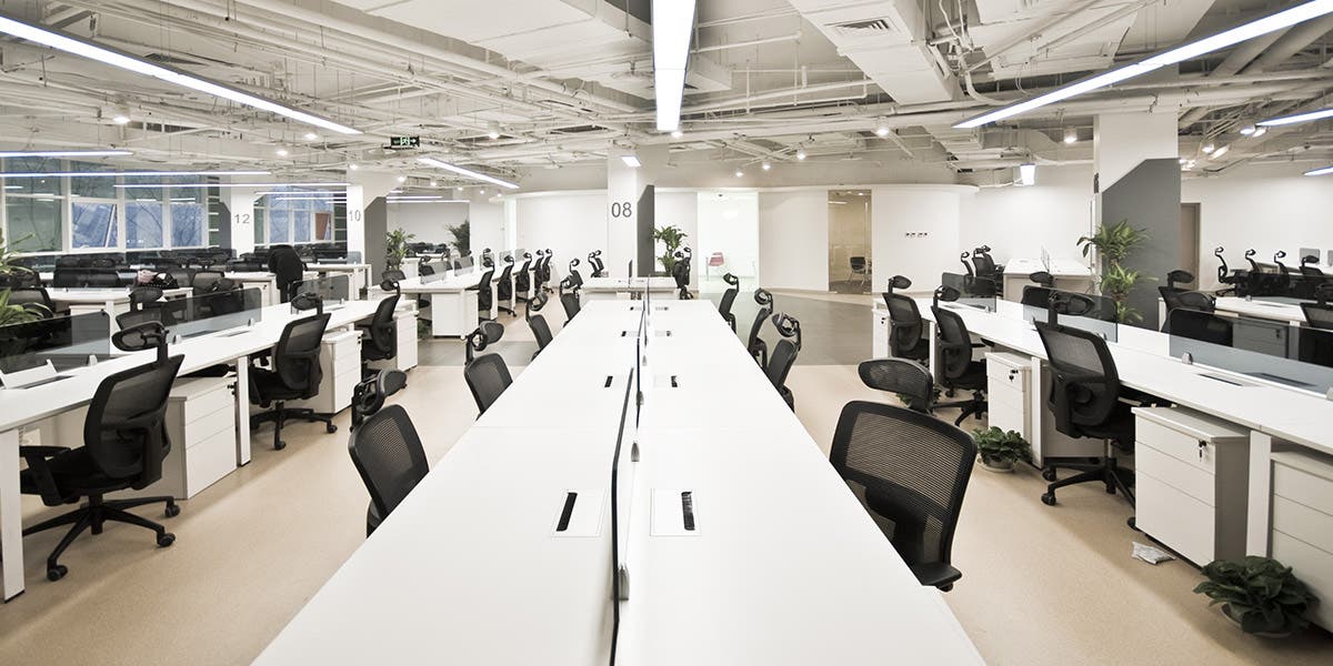 empty office space after workers pivoted to a virtual workplace
