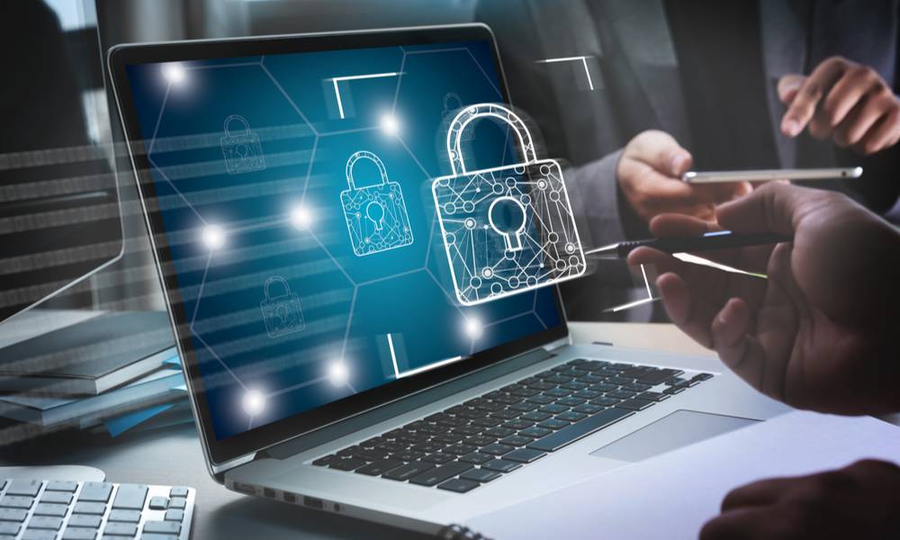 Man installing firewall antivirus on laptop (1).jpg