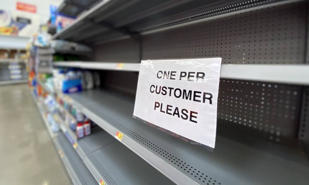 A view of empty shelves at a department store during the Coronavirus pandemic.jpeg