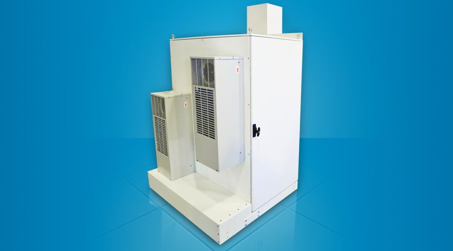 White industrial enclosure with external cooling units mounted on the side, set against a blue background.