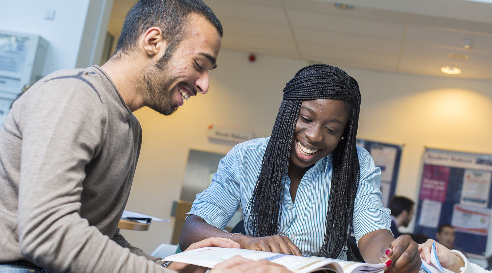 Two students studying at the LJMU International Study Centre