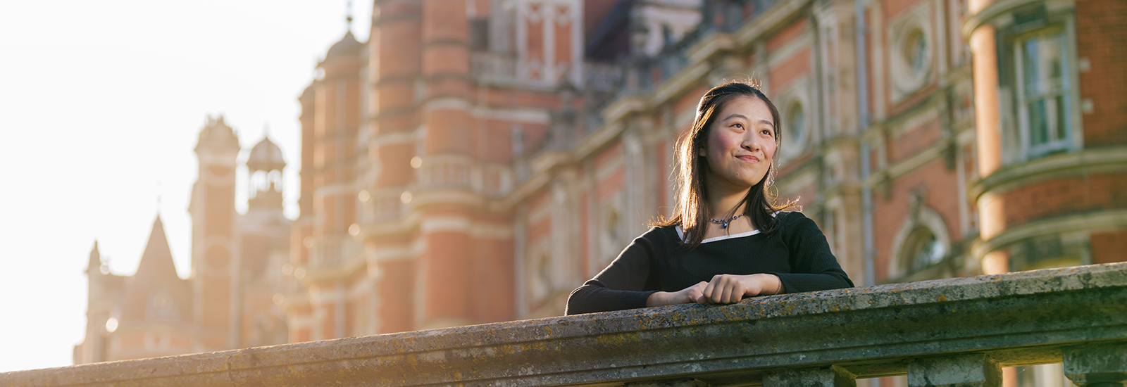 A RHUL student on campus.