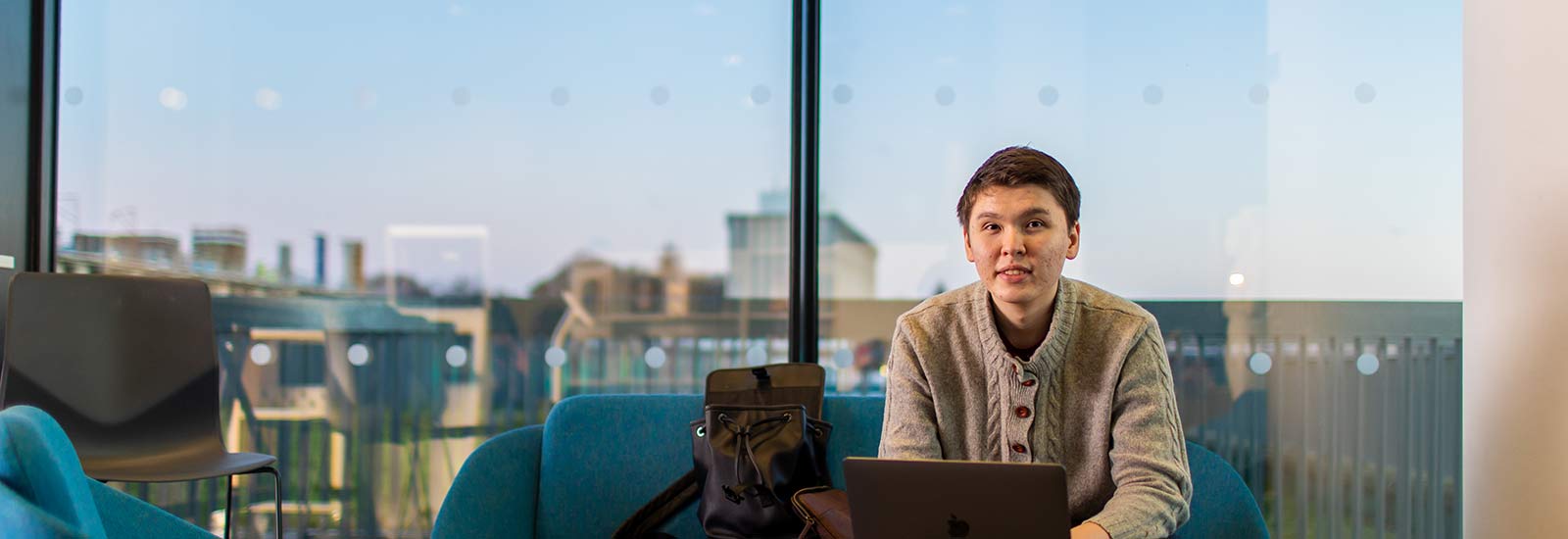 A student sat in the University of Aberdeen campus