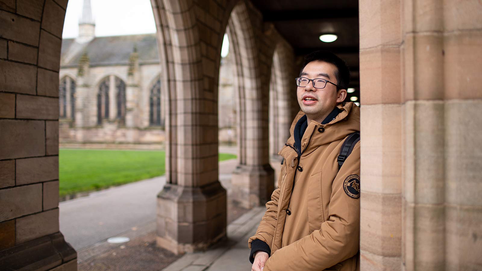 A student smiling outside in Aberdeen