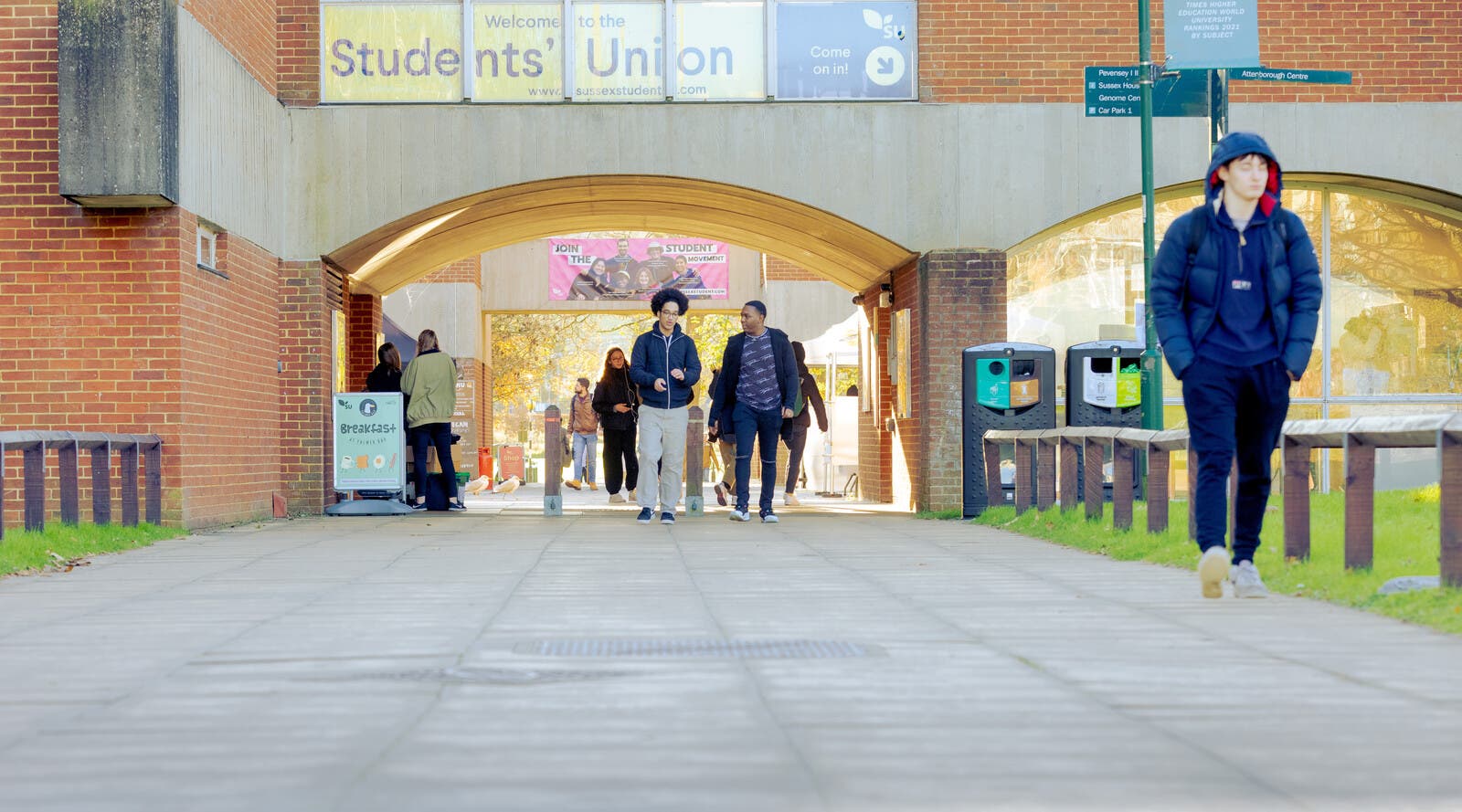 Sussex students walking through campus