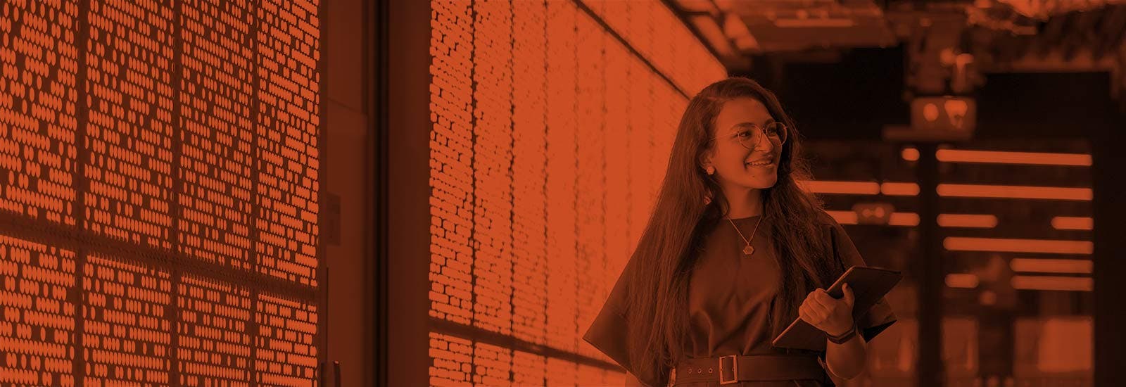 A University of Sussex student walking through campus