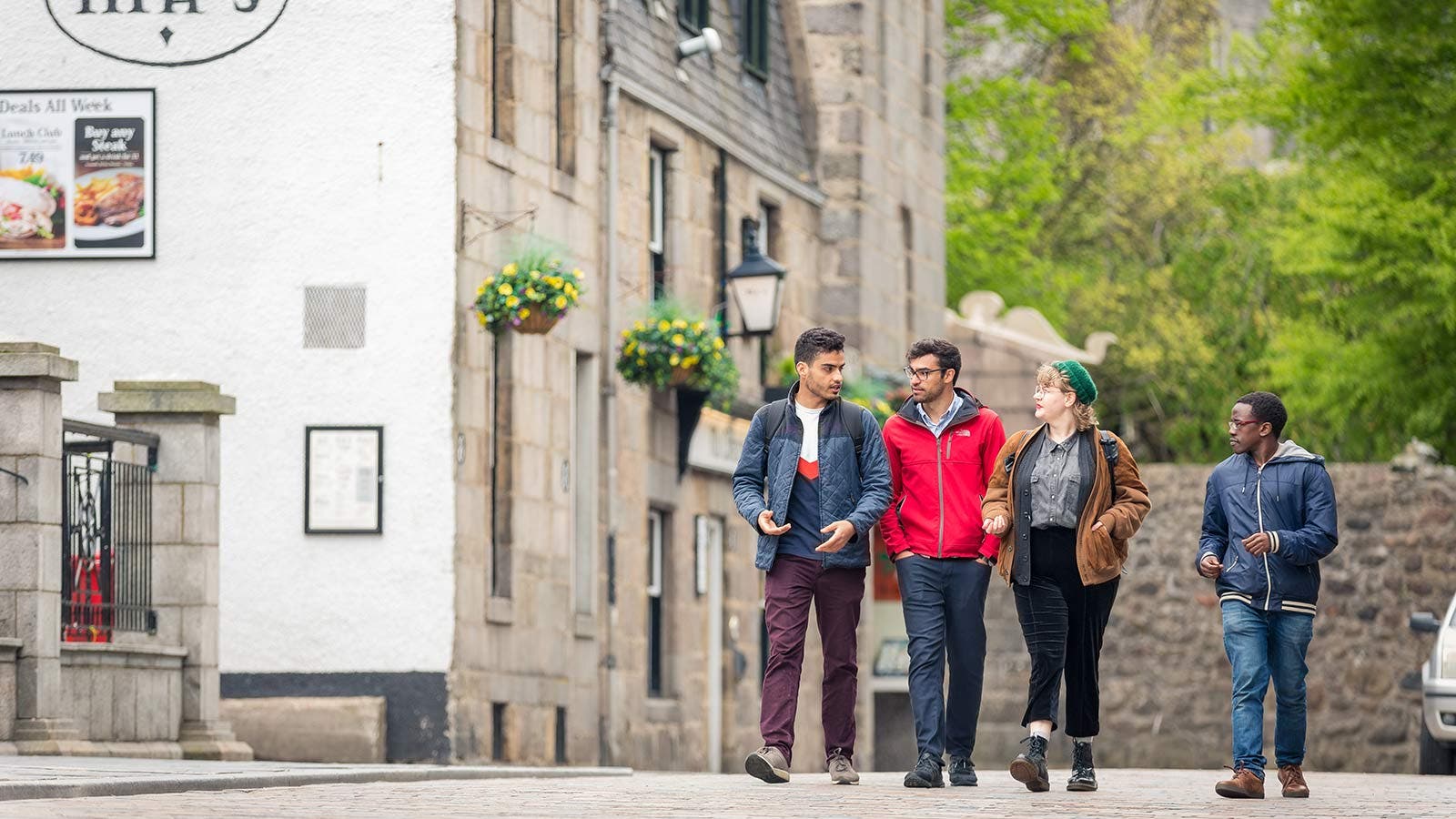 Aberdeen University students walking through the city
